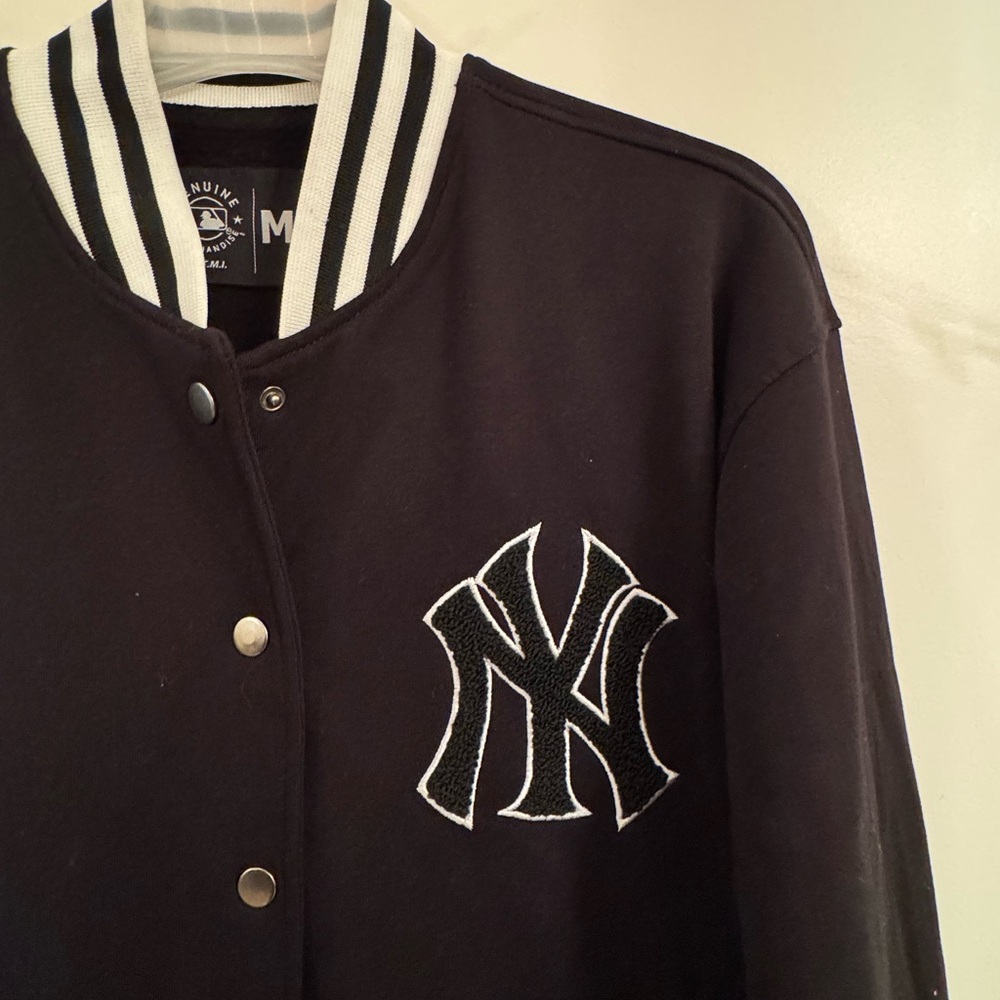 Black Varsity Jacket with White Trim and Embroidered Logo